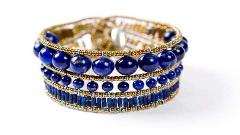Lapis lazuli Ziio bracelet with a sterling silver button clasp.