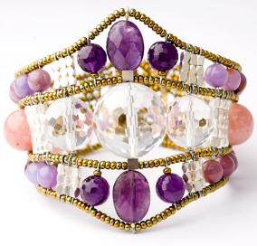Ziio bracelet made with crystal and amethyst has a sterling button clasp.