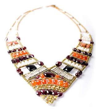 High-fashion Ziio necklace is an artisan masterpiece handmade with garnets, cornaline, pearls and sterling silver.